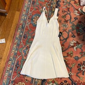 New never worn EXPRESS dress. White tennis/golf dressy vibe. Medium but stretchy